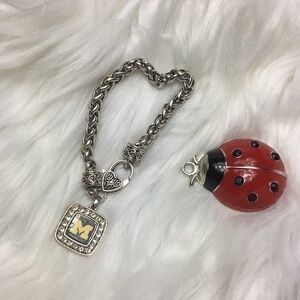 Scroll style, UM logo, 8” bracelet, NWOT.